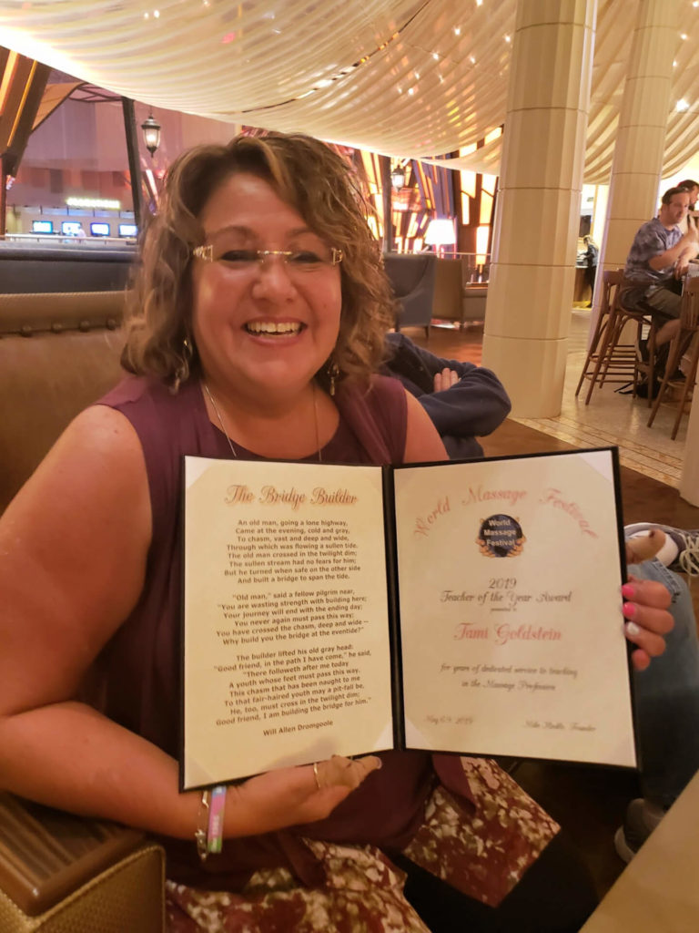 Tami Goldstein with her 2019 Teacher of the Year award